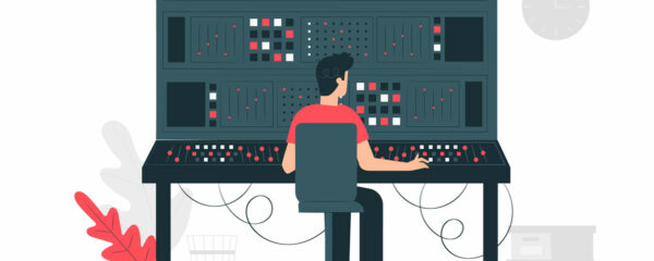 Technicien en chemise rouge travaillant sur un grand tableau de commande avec des écrans et des voyants.